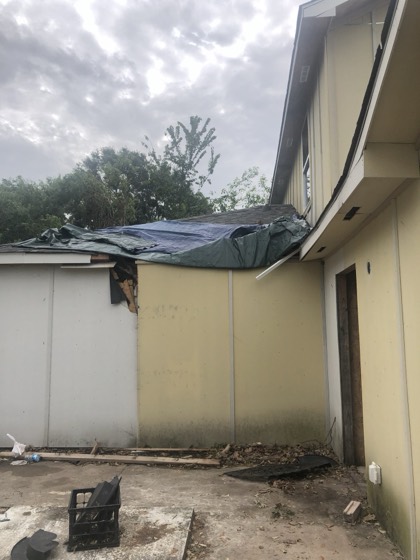 Emergency storm tarp installed — AttarCo Homes roofing & remodeling project, Houston TX