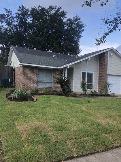 Home exterior with newly installed roof — AttarCo Homes roofing & remodeling project, Houston TX